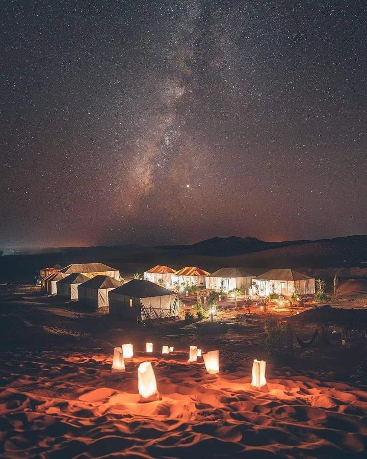 Sahara Majestic Luxury Camp Hotel Merzouga Exterior photo The camp at night