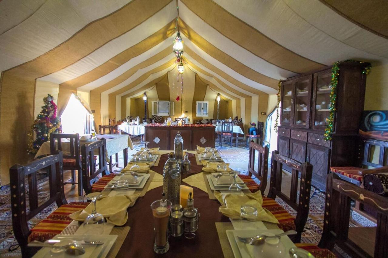 Sahara Majestic Luxury Camp Hotel Merzouga Exterior photo The interior of a tent at the resort